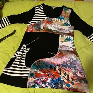 Ladies fun top!   Great for travel.  Cute designs and buttons